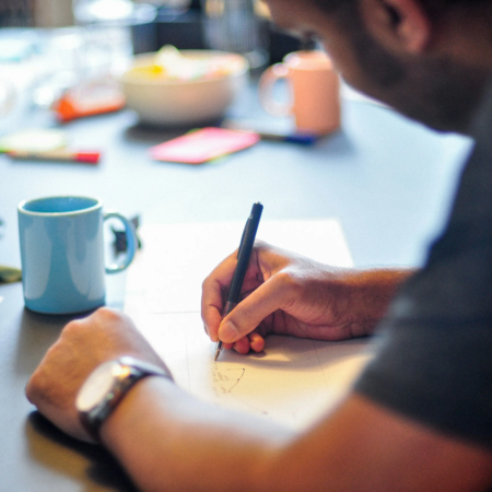 person writing notes